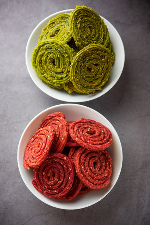 Palak Beetroot chakli or murukku made using spinach and beetroot