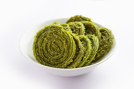 Palak Chakli or Spinach Murukku, healthy Indian festival or tea time snackの写真素材