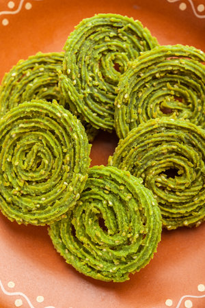 Palak Chakli or Spinach Murukku, healthy Indian festival or tea time snackの写真素材