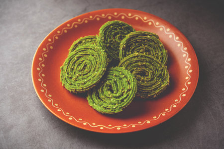 Palak Chakli or Spinach Murukku, healthy Indian festival or tea time snackの写真素材