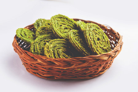 Palak Chakli or Spinach Murukku, healthy Indian festival or tea time snackの写真素材
