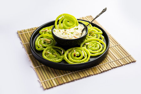 Rabdi Jalebi - Green jilebi or imarati with Rabri made from condensing milk, Indian dessertの写真素材