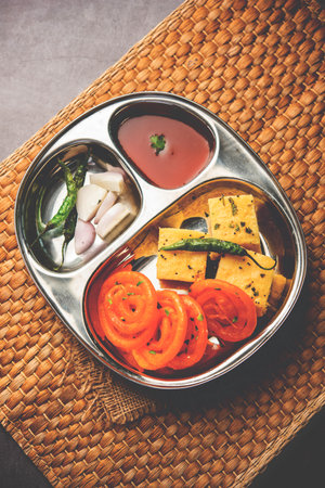 Khaman Dhokla with Jalebi or imarti, popular snack combination from India