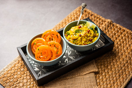 Aloo Poha with Jalebi, snack combination also called imarti and kande poheの写真素材