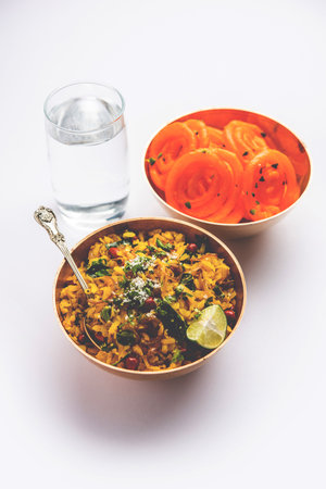 Aloo Poha with Jalebi, snack combination also called imarti and kande poheの写真素材