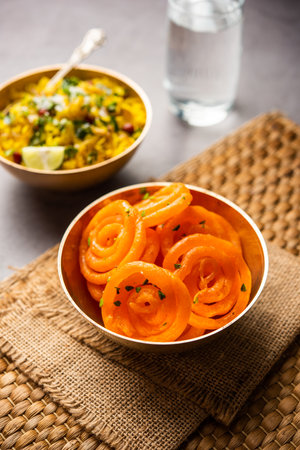 Aloo Poha with Jalebi, snack combination also called imarti and kande pohe