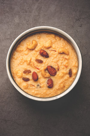 Nolen Gurer Chanar Payesh or Milk pudding of cottage cheese, rice and jaggery, bengali sweet recipeの写真素材