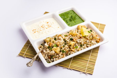 Sabudana Khichadi - An authentic dish from Maharashtra made with sago seeds, served with curdの写真素材