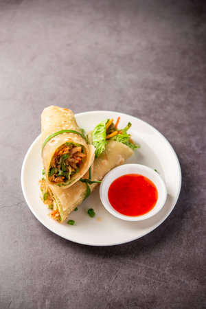 Indian chapati veg spring Rolls filled with vegetables and spices, also called frankyの写真素材