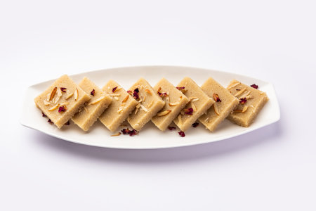 Rava barfiÂ or sooji burfi orÂ barfeeÂ is an Indian Sweet made with semolina, sugar, ghee and...
