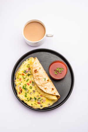 Omelette chapati roll or Franky. Indian Popular, quick healthy recipe for kid's tiffin or lunch boxの写真素材