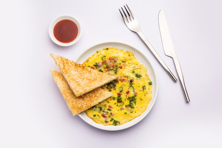 Bread Masala Omelette or OmletteÂ with hot tea Indian styleの写真素材