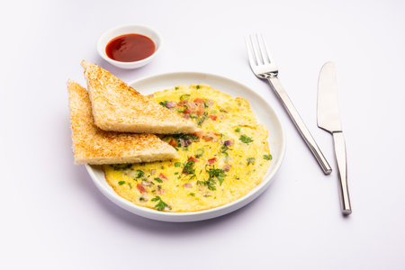Bread Masala Omelette or OmletteÂ with hot tea Indian styleの写真素材