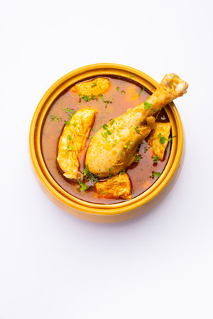 Red Chicken Curry or murgh Masala or korma with prominent Leg Piece