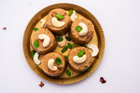 Atta Pinni is a traditional Punjabi winter delicacy, sweet made with wheat flour, ghee, dry fruits