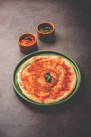 Podi Dosa or dosai is a south indian spicy and delicious recipe with idli milagai podi or gunpowderの写真素材