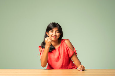 Indian asian girl child with success winner gesture with fistの写真素材
