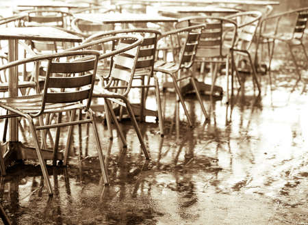 Sidewalk Cafe in the Rainの写真素材
