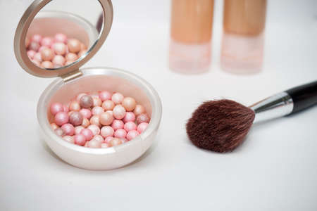 cosmetic brushes brush and rouge  on white  background
