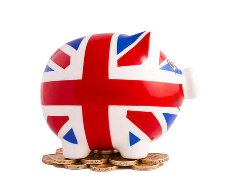 Smiling Union Jack Piggy Bank on white backgroundの写真素材