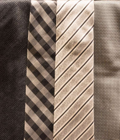 Four Silver Ties with Different Patternsの写真素材