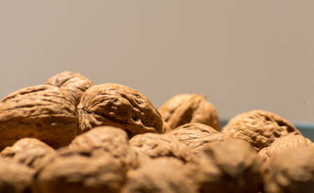 Pile of Walnuts in Shells with Bokeh