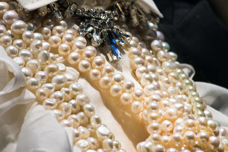 Many Pearls on Necklace with Blue Jewelleryの写真素材