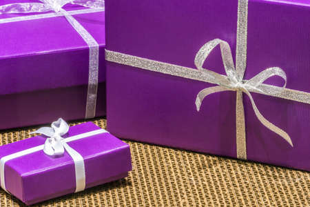 Collection of Purple Parcels tied with Silver Ribbon & Bowsの写真素材