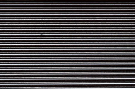 Close-Up Closed Black Shiny Shuttersの写真素材