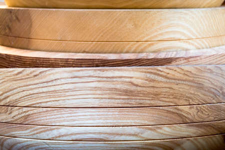 Close-up of Natural Wooden Bowls Stacked Togetherの写真素材