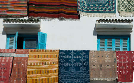 Colorful Mats on Balcony