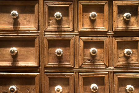 Chest of Square Drawers with White Ornate Handlesの写真素材