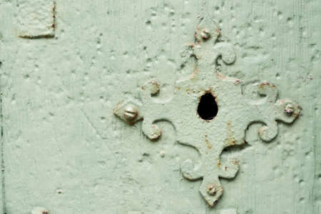 Solid Green Wooden Painted Door and Metallic Lockの写真素材