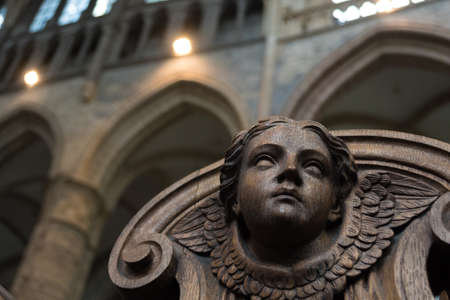 Wooden Angelic Face in Cathedralの写真素材
