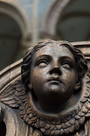 Wooden Angelic Face in Cathedralの写真素材