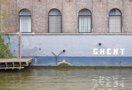 Ghent, Belgium , 4 April 2015 - Charming Hotel Facade looking out over canal waterのeditorial素材