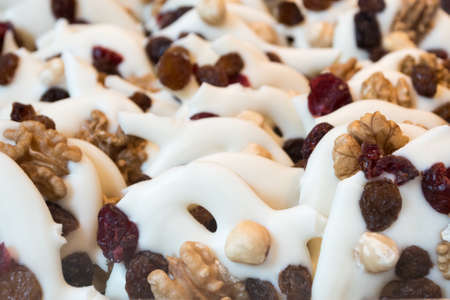 Chocolate and Nut Covered Biscuit Pretzel Cookiesの写真素材