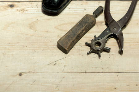 Shoemakers' tools on Wooden Worktop Bench