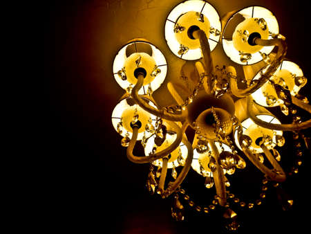 mystical interior with chandelier lights and reflectionsの写真素材