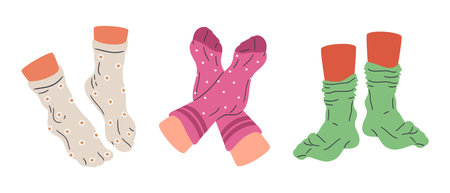 Feet in cotton socks. Feet wearing socks, pair feet in relaxed position flat isolated vector illustration set. Human feet on white backgroundのイラスト素材