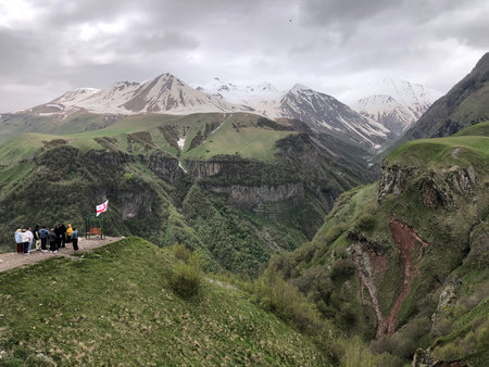Tourists are enjoying the scenery of Caucasus Mountains