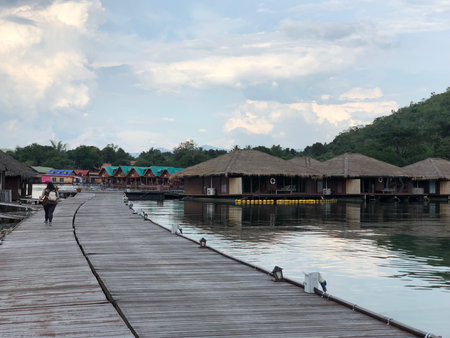 Thatched-roof floating accommodations at a resort in Kanchanaburi, Thailandの写真素材