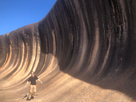 Curved granite formation resembling an ocean wave known as Wave Rock in Western Australiaの写真素材