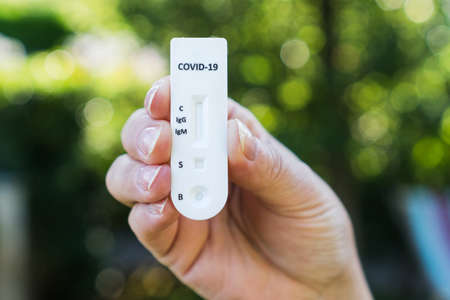 Quick test or diagnostic test to detect Covid-19 or SARS-CoV-2 in humans. Detects igg and igm by obtaining antibodies.の写真素材