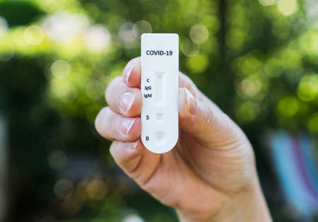 Quick test or diagnostic test to detect Covid-19 or SARS-CoV-2 in humans. Detects igg and igm by obtaining antibodies.の写真素材