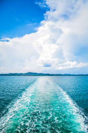 Water trace behind the boatの写真素材