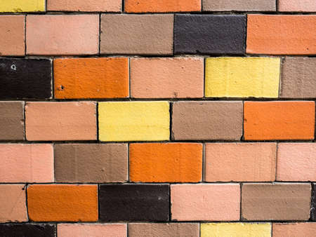 Brick wall texture, where each brick is unique in colorの写真素材