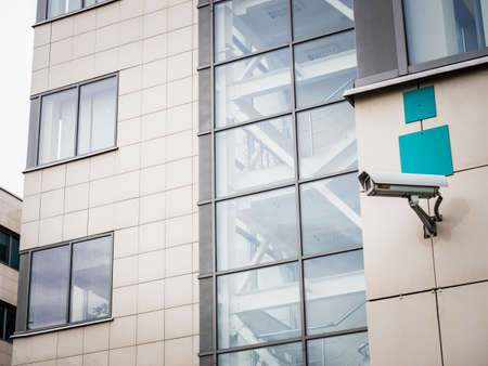 Surveillance camera on the facade of an office building