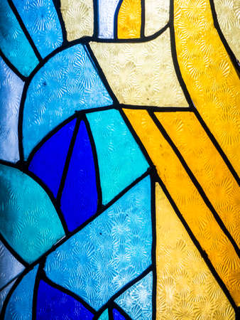 Pattern of colourful glowing Stained glass in interiorの写真素材