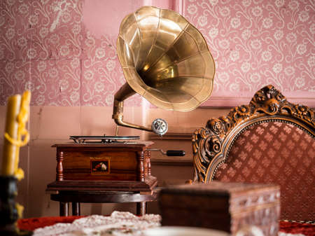 Old vintage gramophone in a quiet interior.の写真素材